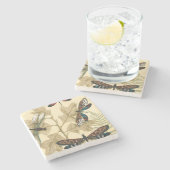 Kleurrijke libellen die boven bladeren drijven stenen onderzetter (Zijkant)