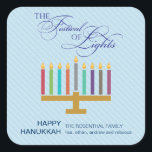Kleurrijke Lichtblauwe Menorah Chanoeka Vierkante Sticker<br><div class="desc">Hier is een leuke graphic look voor een Chanoeka sticker. Een kleurrijke menora markeert een gestreepte borden blauwpaneel met een "lichtfestival" in een typografische behandeling hierboven. Een speciaal aangepast bericht gaat eronder. Geweldig als envelop zegels of voor het plakken op vakantiepakketten of geschenken. Verkrijgbaar in alternatieve kleuren met bijpassende producten....</div>