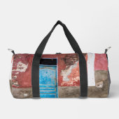 Kleurrijke muur met blauwe deur plunjezak (Voorkant)