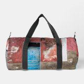 Kleurrijke muur met blauwe deur plunjezak (Achterkant)