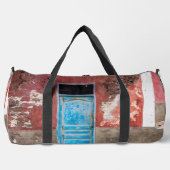 Kleurrijke muur met blauwe deur plunjezak (Voorkant)