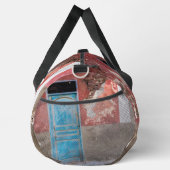 Kleurrijke muur met blauwe deur plunjezak (Rechts)