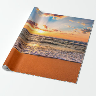 Kleurrijke oceaanstrandzonsopgang met diepe blauwe cadeaupapier
