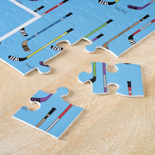 Kleurrijke ockey-sticks: blauwe achtergrond legpuzzel (Zijkant)