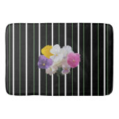 Kleurrijke pansieën en oude stropen badmat (Voorkant)