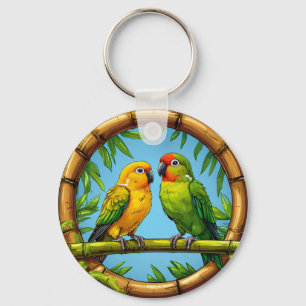 Kleurrijke papegaaien op een bamboe frame sleutelhanger