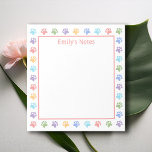 Kleurrijke pastel dierenpootafdrukken en tekst notitieblok<br><div class="desc">Een leuk en kleurrijk randontwerp van verschillende kleuren dierenpootafdruk silhouetten. De kleuren zijn blauw,  paars,  roze,  oranje en groen. Er is ook een aanpasbaar tekstgebied voor een titel.</div>