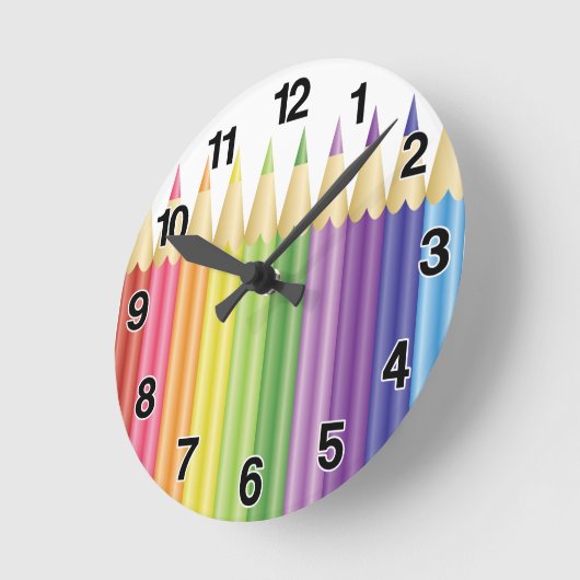 kleurrijke pennen in rij ronde klok (Hoek)