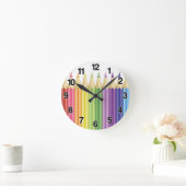 kleurrijke pennen in rij ronde klok (Huis)