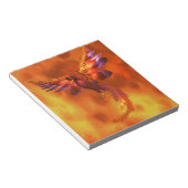 Kleurrijke Phoenix die tegen een vurige achtergron Notitieblok (Schuin)