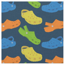 Kleurrijke plastic schokken schuiven op gevlochten stof