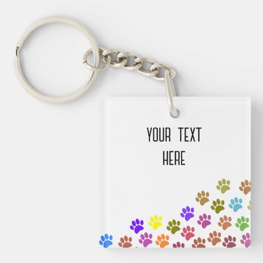 Kleurrijke Puppy Paw Prints met aangepaste tekst Sleutelhanger (voorkant)