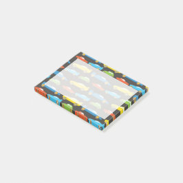 Kleurrijke raceauto's op zwart post-it® notes