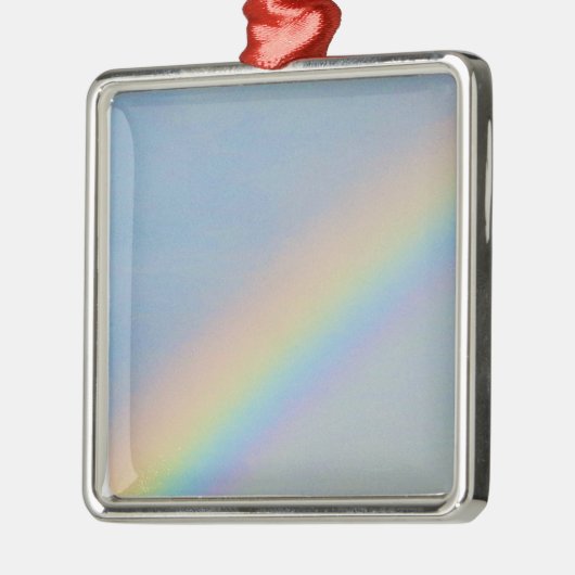 Kleurrijke regenboog in blauwe hemel, foto metalen ornament (Links)