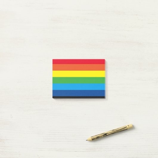 Kleurrijke regenboog post-it® notes (Op bureau)