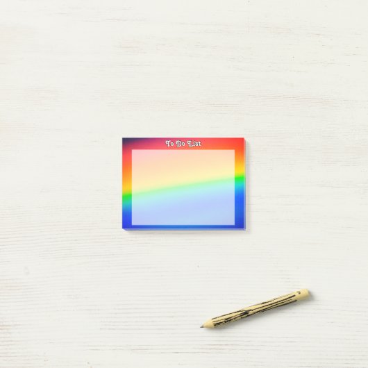 Kleurrijke regenboog post-it® notes (Op bureau)