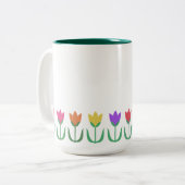 Kleurrijke regenboogbuizen, lentbloemen tweekleurige koffiemok (Voorkant links)