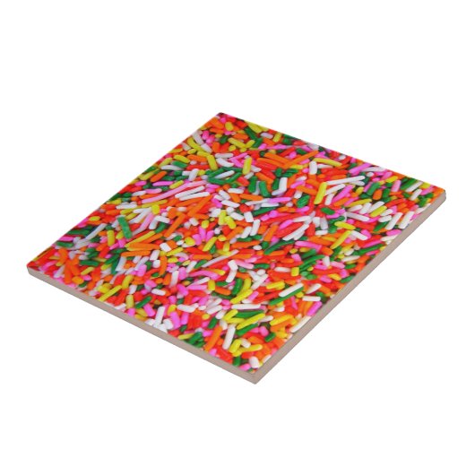 Kleurrijke regenboogspringen tegeltje (Zijkant)