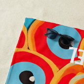 Kleurrijke Rode Blauwe Strandtowel met Boze Oog Strandlaken (In situ)