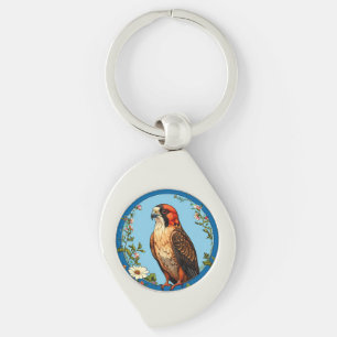 Kleurrijke roodpootvalk vogel sleutelhanger