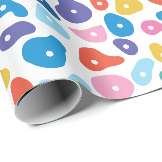 Kleurrijke rotsklimmende voet houdt inpakpapier (Rol Hoek)