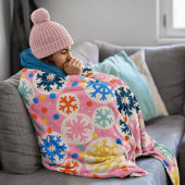 Kleurrijke sneeuwvlokken op roze vakantiepatroon fleece deken