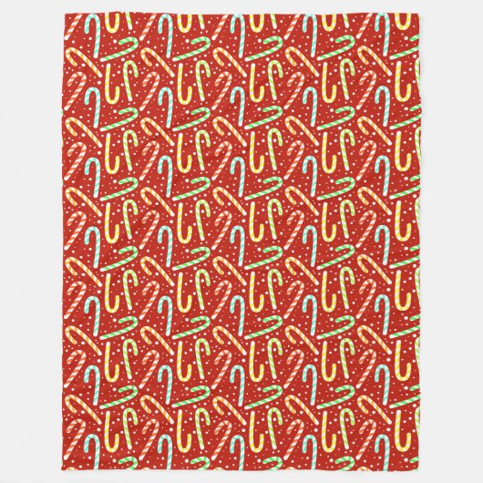 Kleurrijke snoepjes met sneeuw op rood fleece deken (Voorkant)