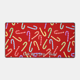  kleurrijke snoepjes op rood bureaumat