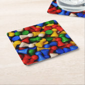Kleurrijke Stapel van Houten Spelstukken Kartonnen Onderzetters (Schuin)