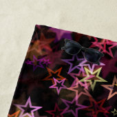 Kleurrijke sterren dansen grillig strandlaken (In situ)