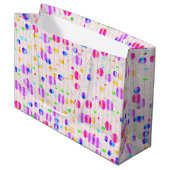 Kleurrijke stippen op roze cadeautas (Voorkant Gekanteld)