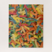 Kleurrijke suikerbeklede kauwzoete ondergrond legpuzzel (Verticaal)