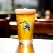 kleurrijke touroperator die op een tak zit glas