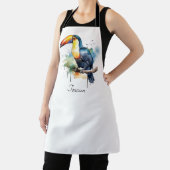 kleurrijke touroperator die op een tak zit schort (Insitu)