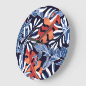 Kleurrijke tropische bladeren blauwe achtergrond grote klok (Hoek)