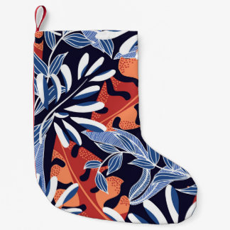 Kleurrijke tropische bladeren blauwe achtergrond kleine kerstsok