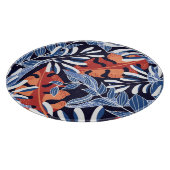 Kleurrijke tropische bladeren blauwe achtergrond snijplank (Hoek)