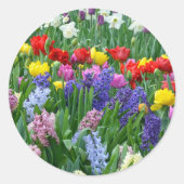 Kleurrijke veestbloementuin ronde sticker (Voorkant)