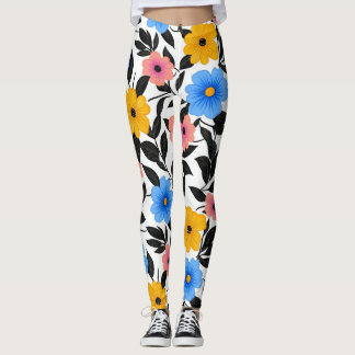 Kleurrijke viering van bloemen en bladeren leggings