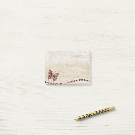 Kleurrijke vlinder post-it® notes (Op bureau)