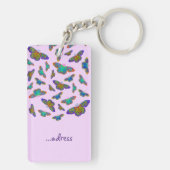 Kleurrijke vlinders op baby roze sleutelhanger (achterkant)