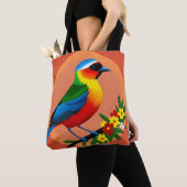 Kleurrijke vogel neergestreken tussen levendige bl tote bag (Dichtbij)