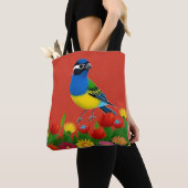 Kleurrijke vogel neergestreken tussen levendige bl tote bag (Dichtbij)