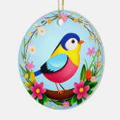 Kleurrijke vogel omringd door bloemenkrans keramisch ornament (Links)
