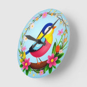 Kleurrijke vogel omringd door bloemenkrans ronde klok (Hoek)