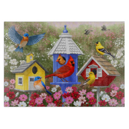 Kleurrijke vogels en vogelhuizen snijplank