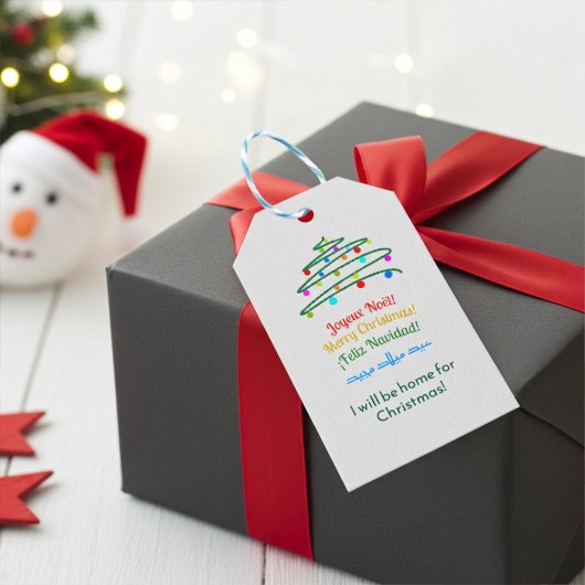 Kleurrijke vrolijke internationale vrolijke kerstb cadeaulabel