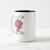 Kleurrijke werveling van stoombrouwsel om energies tweekleurige koffiemok (Voorkant links)