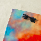 Kleurrijke wolken gooien kussen strandlaken (In situ)