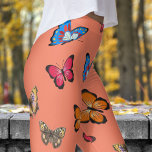 Kleurrijke zalm roze vlinders patroon leggings<br><div class="desc">Graceful Style, Bold Comfort: Voeg een vleugje charme toe aan uw dag met deze Butterfly-leggings! Met een kleurrijk, in het oog springend ontwerp, bieden ze zowel schoonheid als comfort voor elke gelegenheid. Of je nu aan het loungen bent of onderweg, deze leggings zullen je blik naar het volgende niveau brengen....</div>